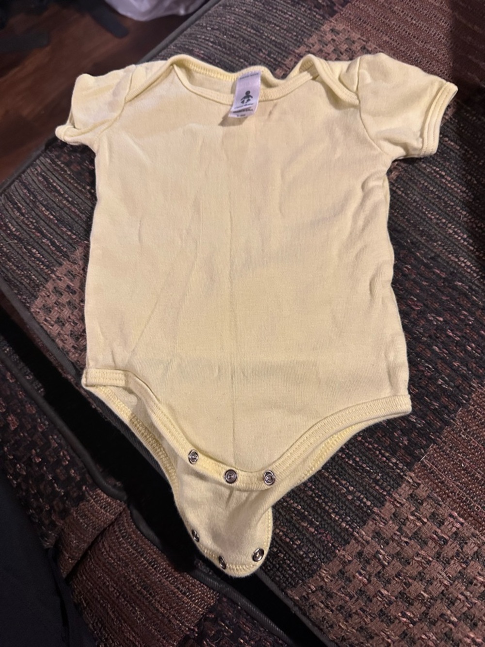 American Apparel Pale Yellow Baby Bodysuit